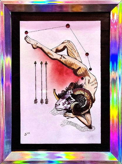 A framed art print featuring a stylized illustration of a nude figure with a ram's head, connected to constellation dots, with three arrows on a pale pink background. The print is housed in a thick black frame with a highly reflective, iridescent holographic border that displays rainbow colors.