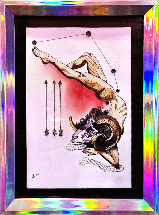 A framed art print featuring a stylized illustration of a nude figure with a ram's head, connected to constellation dots, with three arrows on a pale pink background. The print is housed in a thick black frame with a highly reflective, iridescent holographic border that displays rainbow colors.