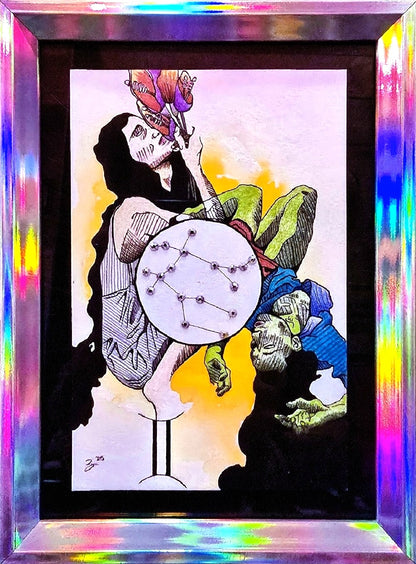 A framed art print featuring a surreal zodiac illustration with a woman holding a drum, a bird, and a seated figure in blue, set against a black frame with iridescent rainbow reflections.